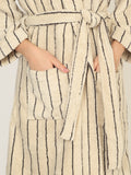 Beige robe with black stripes and a belt on a white background