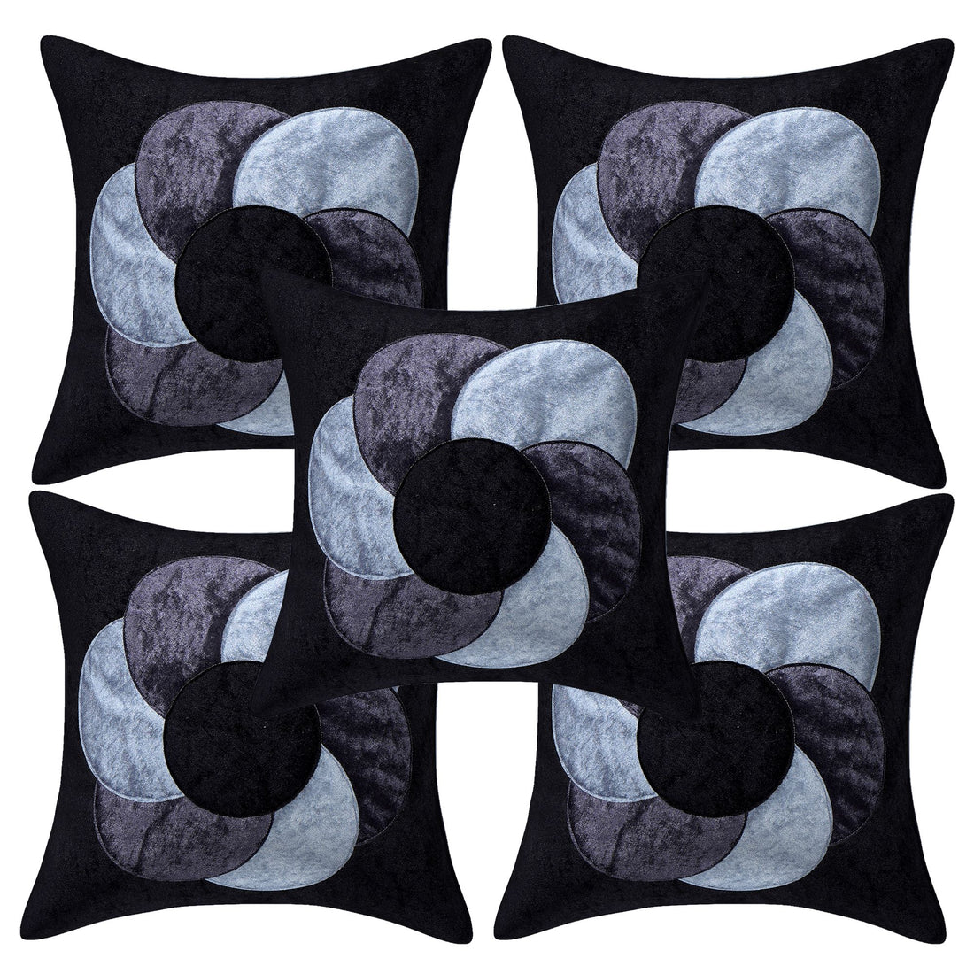Set of four decorative pillows with black, gray, and blue circular patterns on a white background.