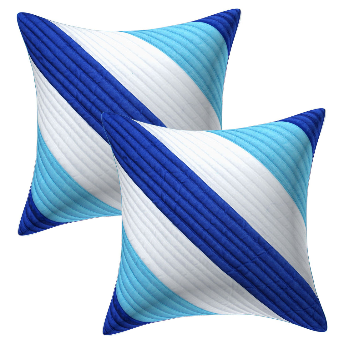Set of blue and white striped pillows on a beige sofa with abstract art in the background.