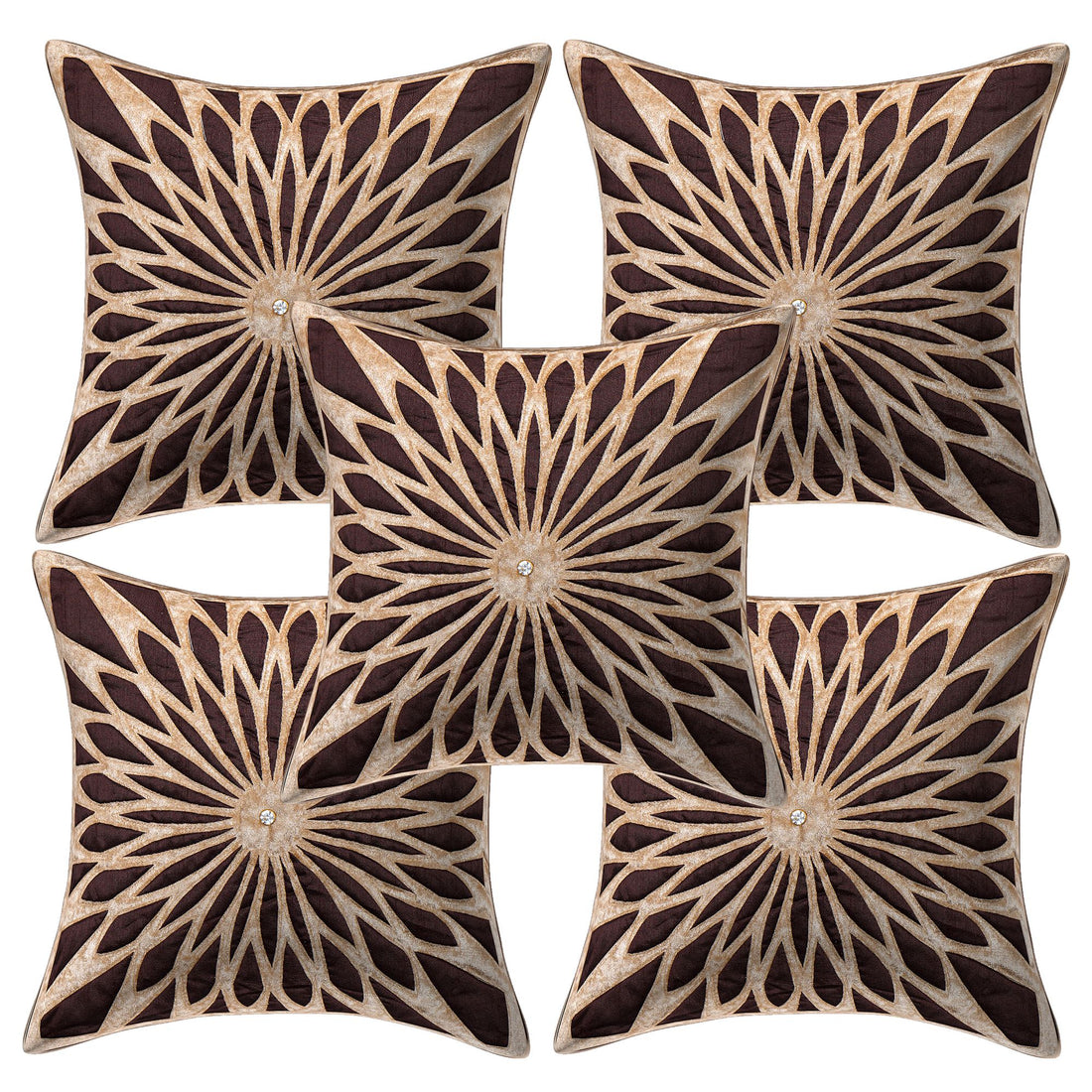 Decorative pillows with sunburst pattern on a gray sofa in a living room setting.