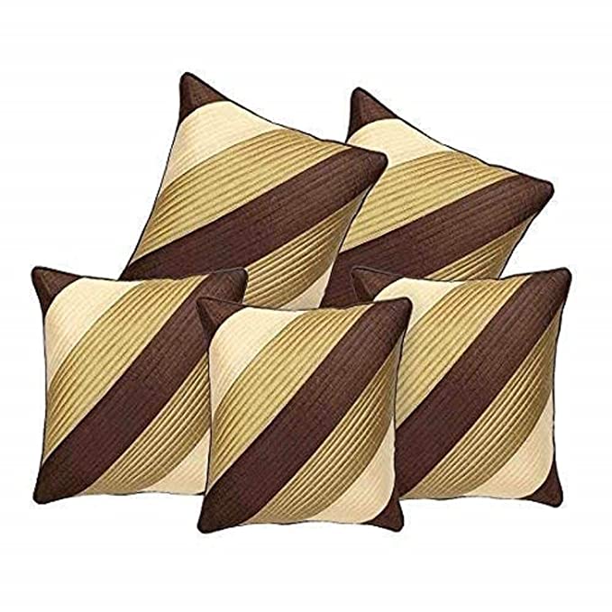 Beige sofa with striped brown and beige cushions in a living room setting.