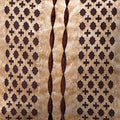 Textured fabric with geometric pattern in brown and beige