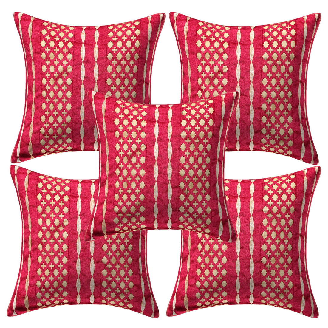 Red patterned pillows on a gray sofa with abstract art in the background