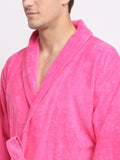 Close-up of a man wearing a fuchsia cotton bathrobe with a tie belt