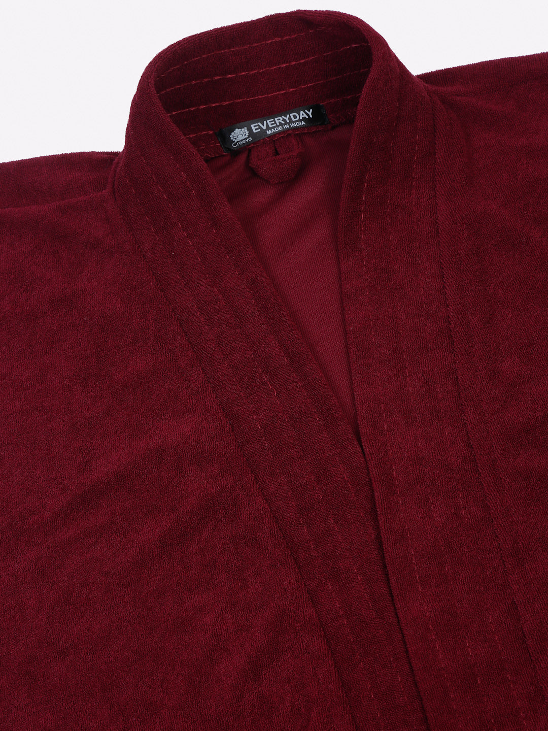 Close-up of a grape wine micro terry bathrobe showing the collar and fabric texture
