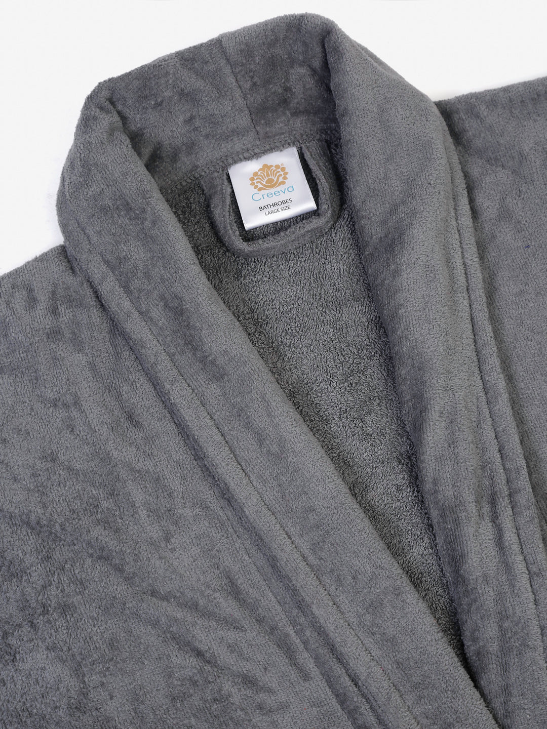 Close-up of a grey cotton bathrobe showing the collar and fabric texture