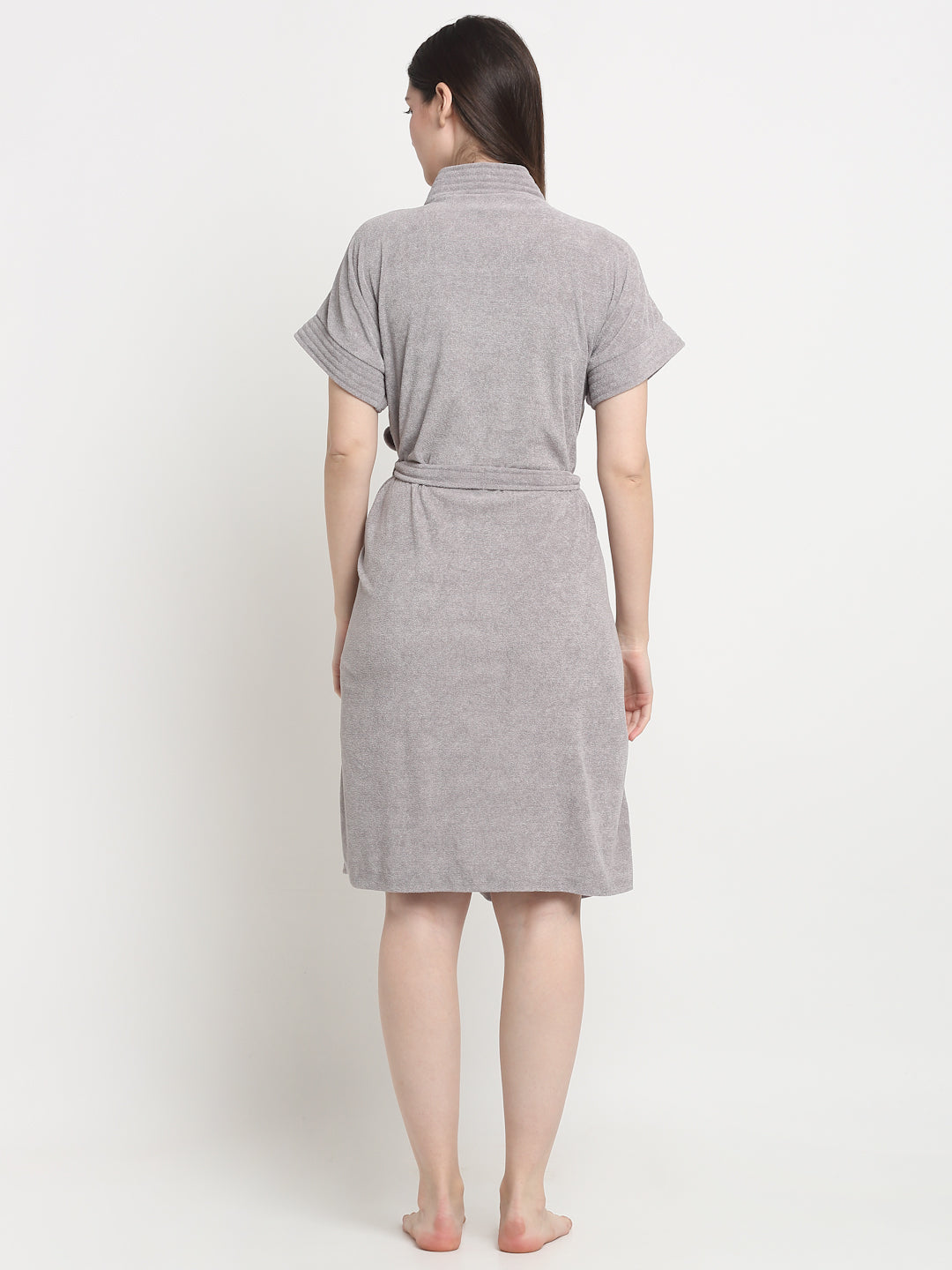 Back view of a woman wearing a Grey micro terry bathrobe with a tie belt
