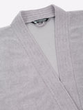 Close-up of a grey micro terry bathrobe showing the collar and fabric texture