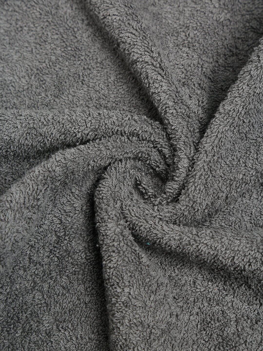 Grey cotton hand towel with a soft textured terry fabric surface.