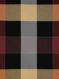A close-up of a woven plaid fabric with a grid pattern in black, gray, beige, rust orange, and burgundy.