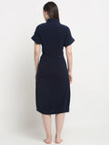 Back view of a woman wearing a Navy Blue micro terry bathrobe with a tie belt
