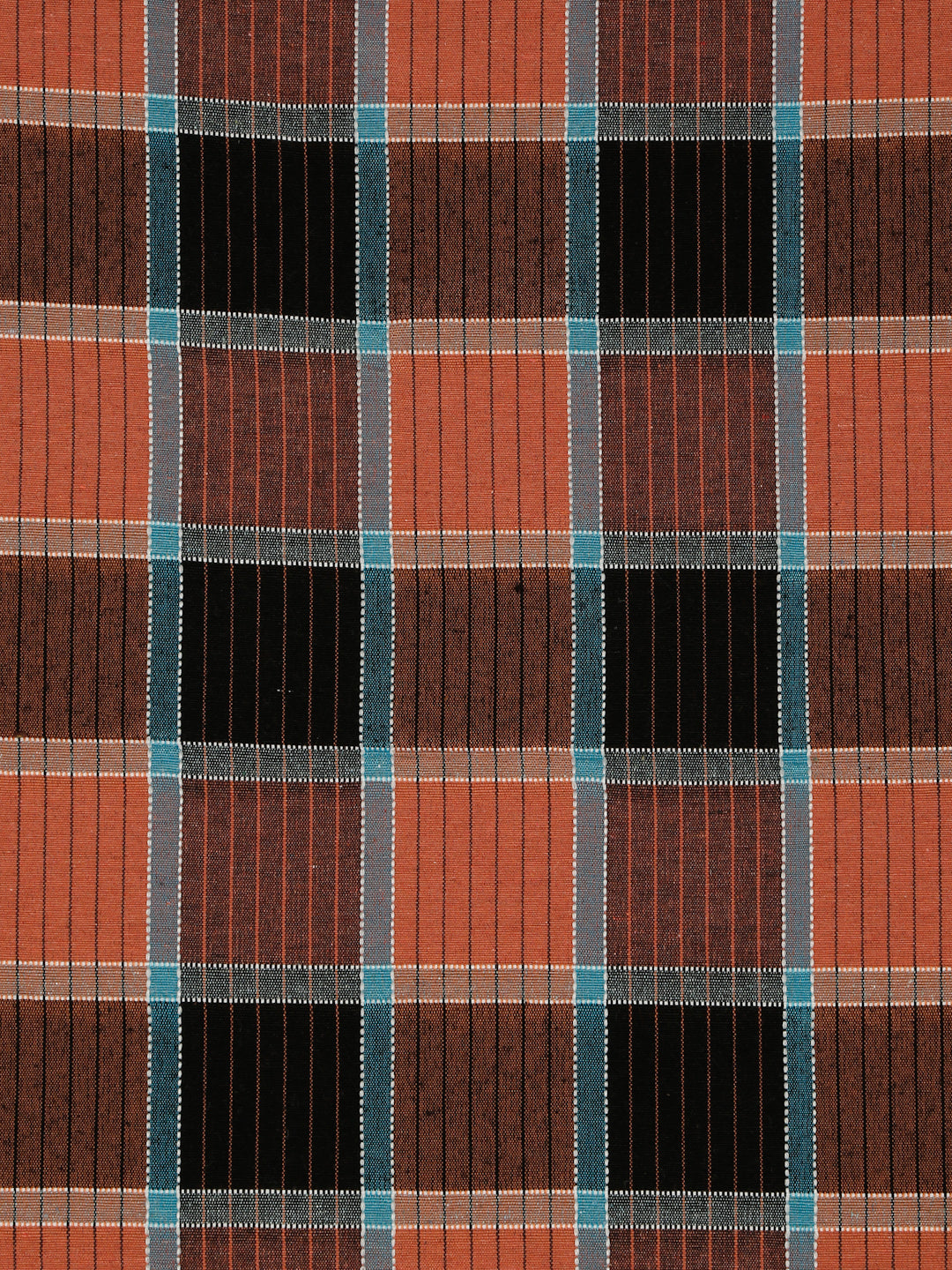 A close-up of a plaid fabric pattern with rust orange, dark brown, black, and teal-blue stripes.