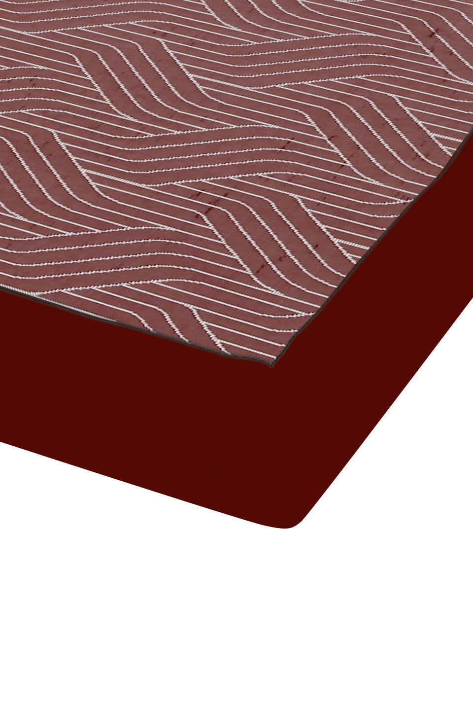 Red and Brown bed sheet corner on a white background