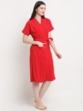 A Woman wearing a red micro terry bathrobe with a tie belt
