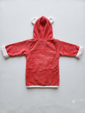 A red hooded bathrobe with white trim on the cuffs and hem, featuring white bear ears on the hood, laid flat on a light gray background.