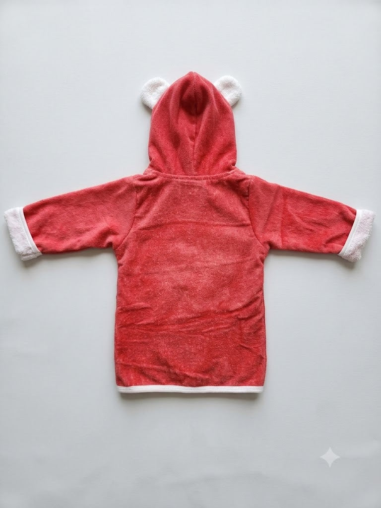 A red hooded bathrobe with white trim on the cuffs and hem, featuring white bear ears on the hood, laid flat on a light gray background.