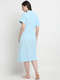 Back view of a woman wearing a Sky Blue micro terry bathrobe with a tie belt
