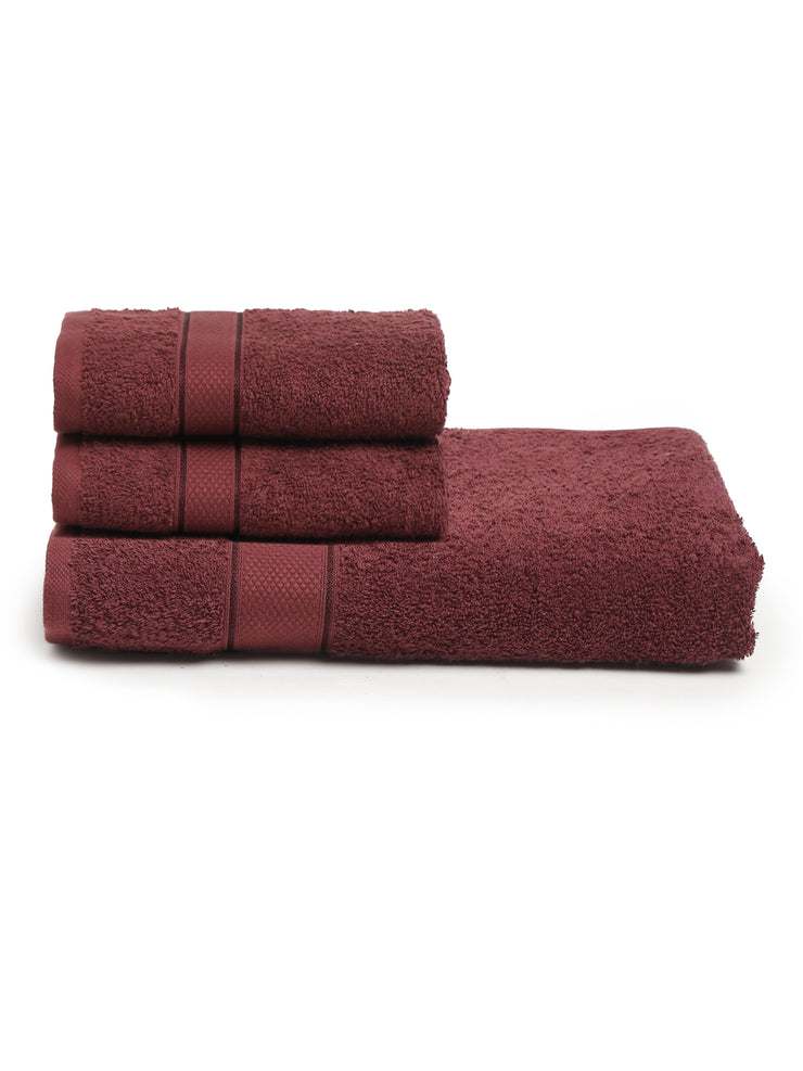 Set of maroon towels neatly folded on a white background.
creeva wine color towels