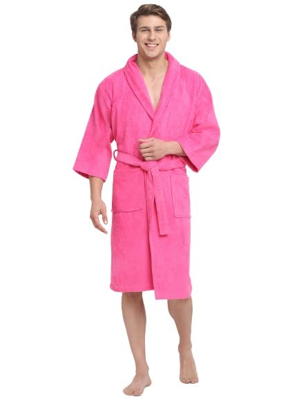 A person wearing a fushchia unisex cotton bathrobe, smiling.