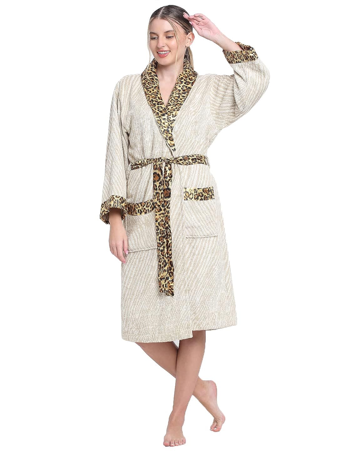 A Smile Woman wearing a cream bathrobe with leopard print shawl collar, cuffs, belt and pockets 